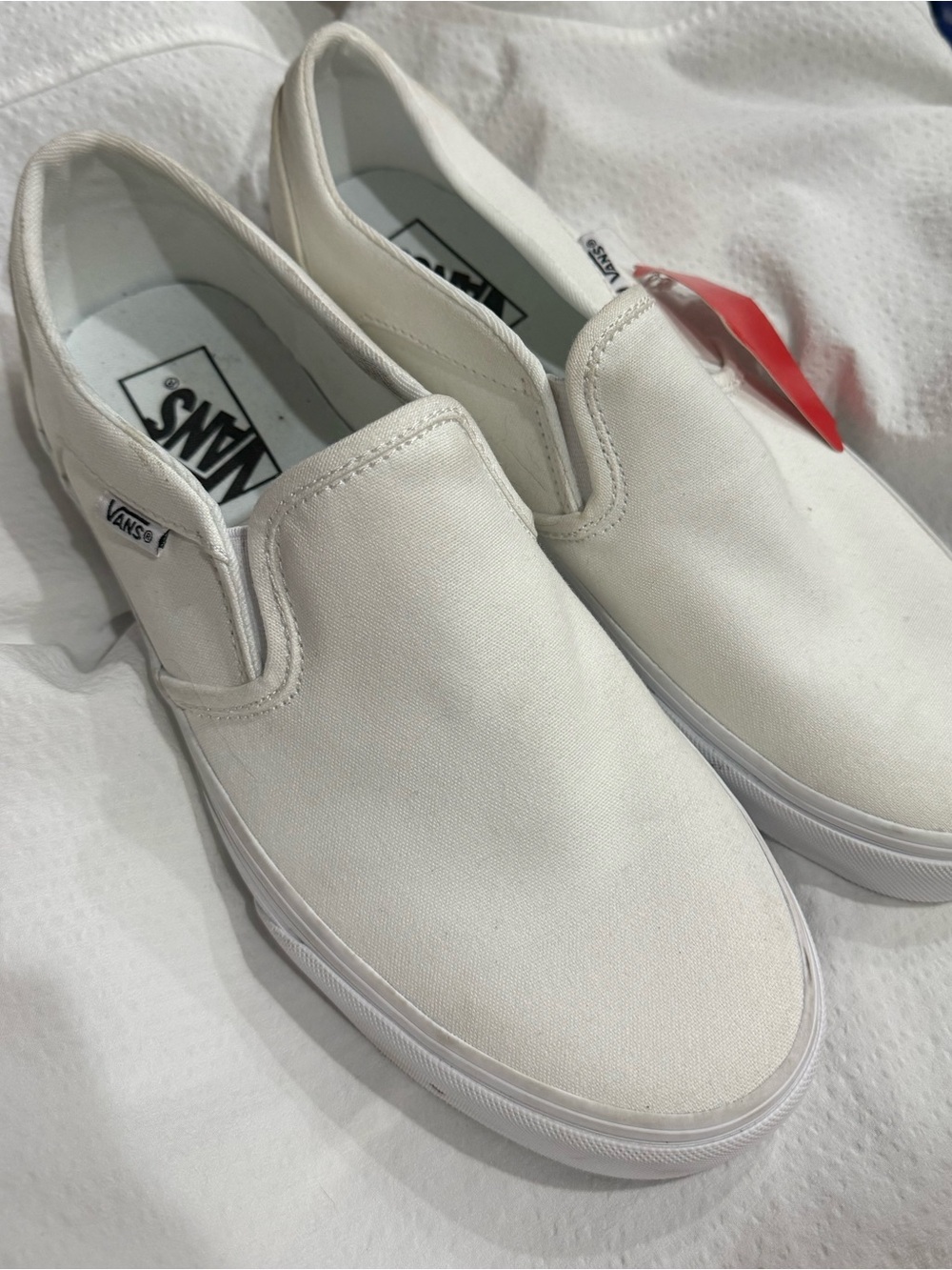 Vans White Canvas Slip-On Sneakers